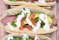 Sizzling Grilled Flank Steak Tacos with Cool Avocado Lime Crema