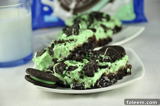 Triple Layer Fudge Mint Oreo Brownies are rich and loaded with chocolate goodness. Everyone will go crazy over this dessert recipe and it's a festive green!
