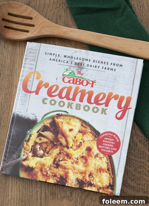 The cover of the Cabot Creamery Cookbook, featuring enticing recipes and highlighting the brand's commitment to quality cheese.
