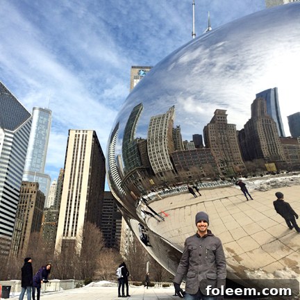 My husband at the Bean in Millennium Park, Chicago, a popular spot for tourists and locals alike.