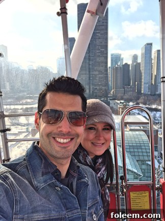 Riding the Ferris Wheel in Chicago at the Navy Pier, offering panoramic views of the city skyline.