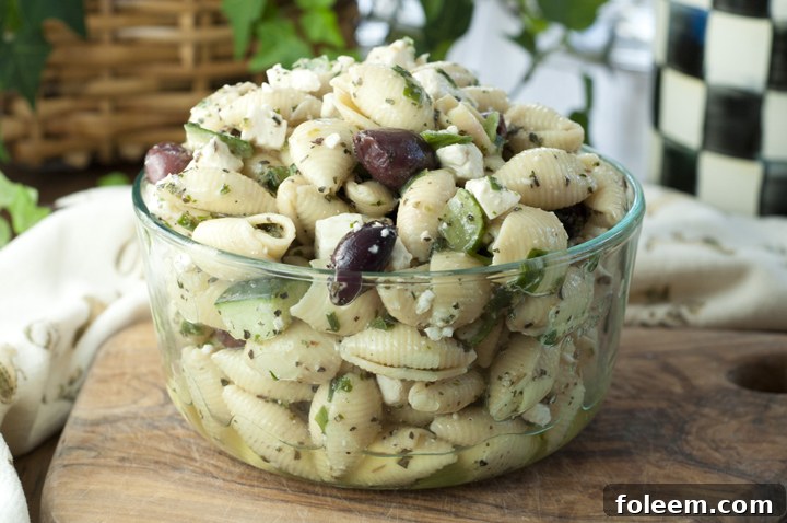 This recipe for Greek Pasta Salad has all of the simple flavors of a classic Greek salad with cucumber, olives, and crumbled feta cheese. Great side dish for any summer BBQ, holiday, or picnic.