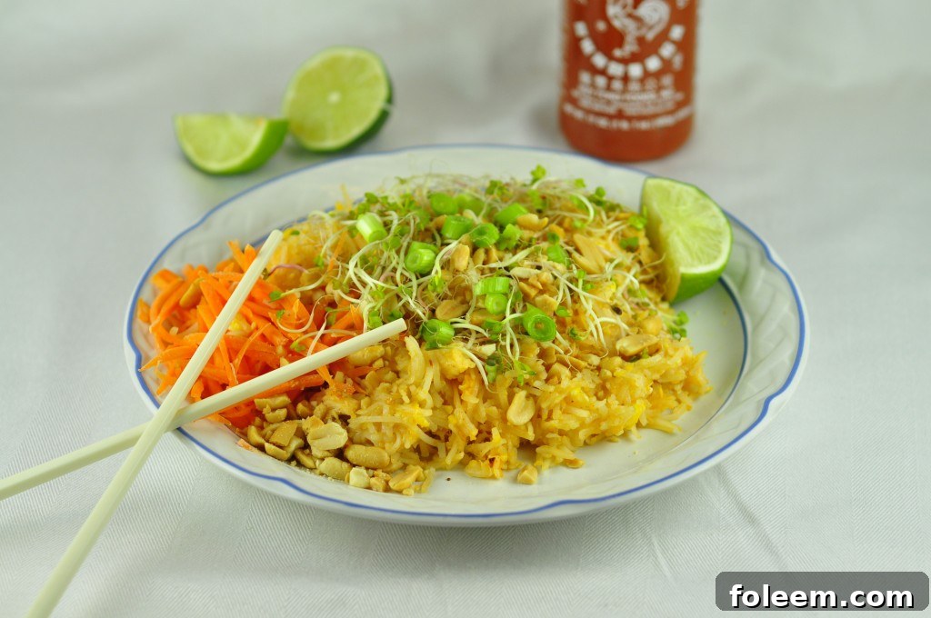 Delicious Homemade Chicken Pad Thai with a spicy chili sauce