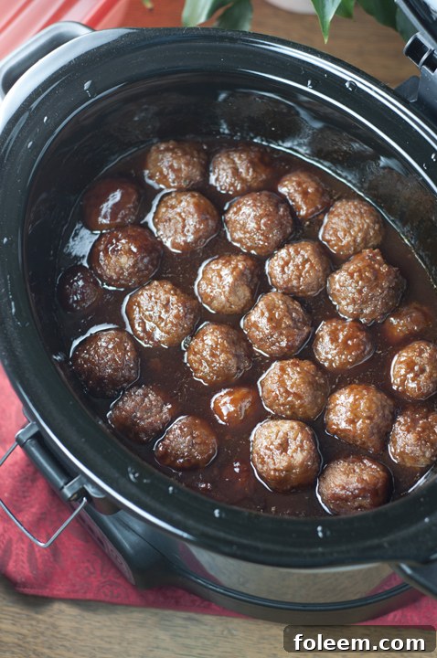 Slow Cooker Grape Jelly Barbeque Party Meatballs appetizer recipe for holiday entertaining, Super Bowl, or pot luck made right in the crock pot.