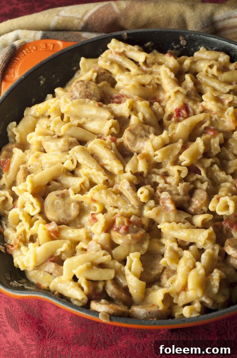 Creamy, Cheesy Chicken Sausage Pasta Skillet is all made in one skillet and comes together in just 20 minutes!