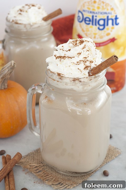 Slow Cooker Pumpkin Spice Lattes for a crowd are perfect for fall parties and easy to make in a crock pot.