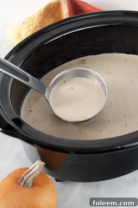 Easy Crock Pot Pumpkin Spice Lattes are perfect for large gatherings and parties in the fall season.