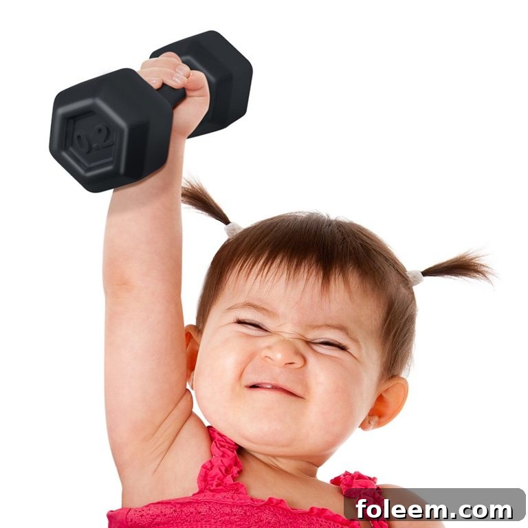 Buff Baby Dumbbell Rattle, a fun and unique baby gift for new parents.