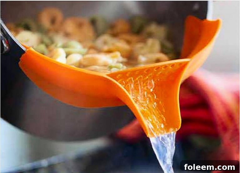 Clip-On Silicone Strainer, a practical and space-saving kitchen tool.
