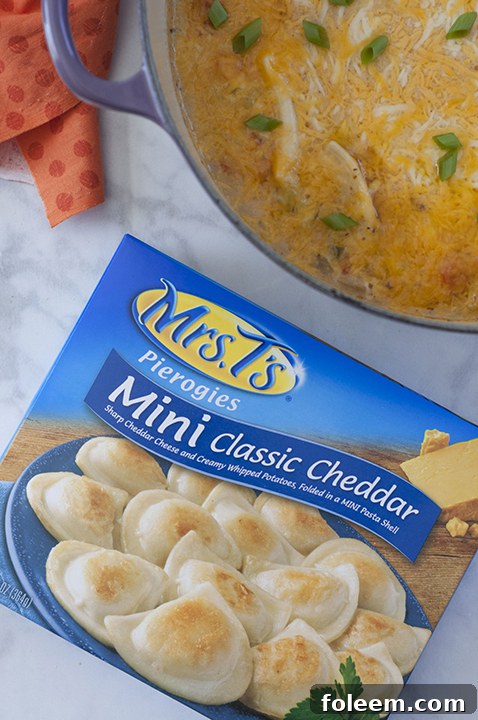 Easy, Cheesy Cajun Chicken Pierogy Bake Recipe is classic comfort food that will take your weeknight dinner to a whole new level. It is all made in one dish complete with chicken and veggies!