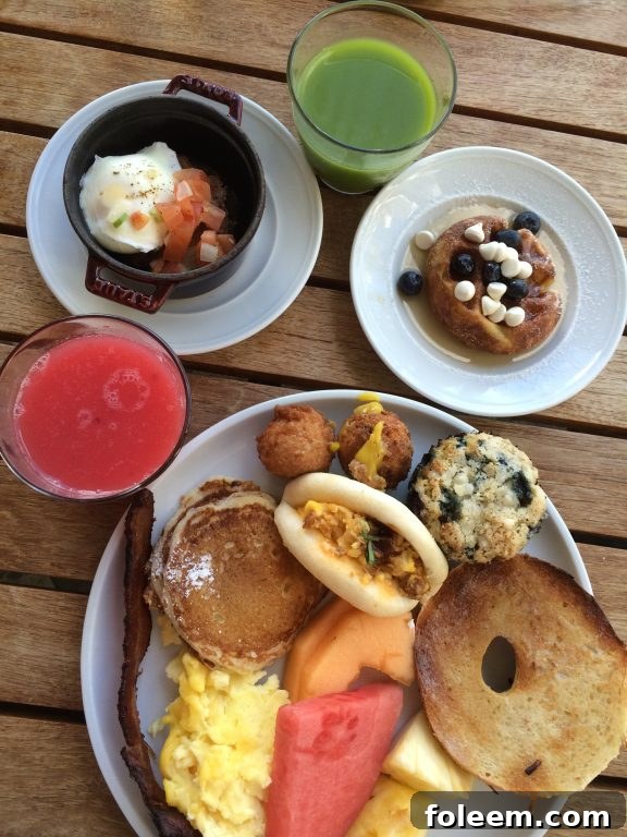A vibrant breakfast buffet spread at the Andaz Maui Hyatt resort, featuring an array of fresh and delicious options.