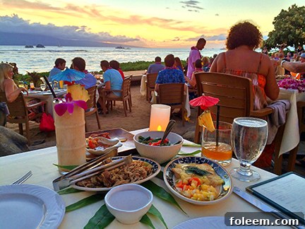 Delicious food and vibrant drinks served at the Feast at Lele Luau in Maui, Hawaii.