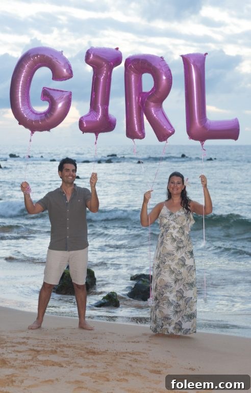 Official Baby Gender Reveal photo we took on the beach in Maui, Hawaii with balloons.