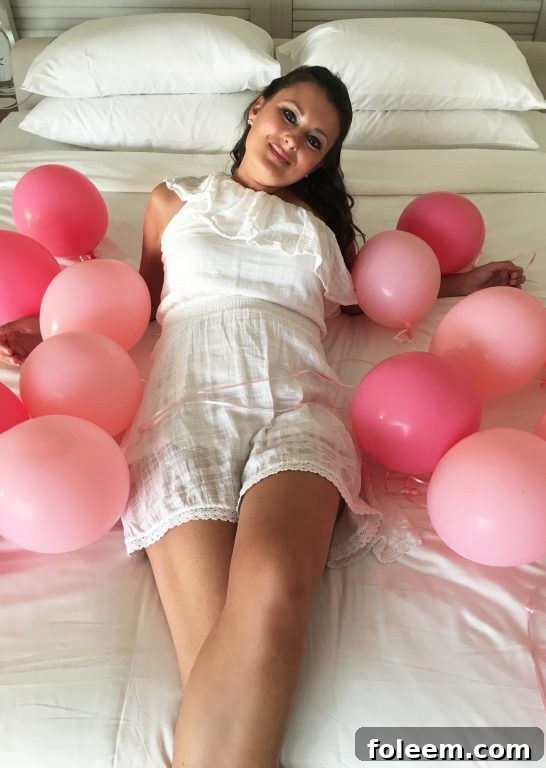 Our Creative Gender Reveal Surprise: Pink Balloons on the Bed at the Andaz Maui