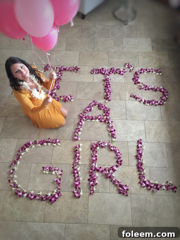 The Andaz Maui, Hawaii gender reveal in our resort suite complete with balloons and flowers.