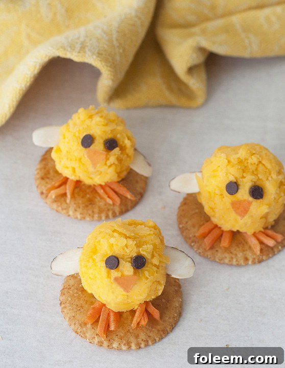 Adorable Baby Chick Mini Cheese Balls, a delightful and easy Easter appetizer perfect for holiday gatherings and fun snacks.