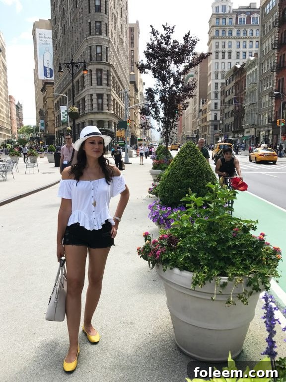Exploring the Flatiron District neighborhood in Manhattan, enjoying a refreshing drink from Argo Tea.
