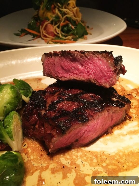 Ribeye Steak at Hillstone or Houston's Restaurant in New York City, known for its perfectly cooked and flavorful dishes.