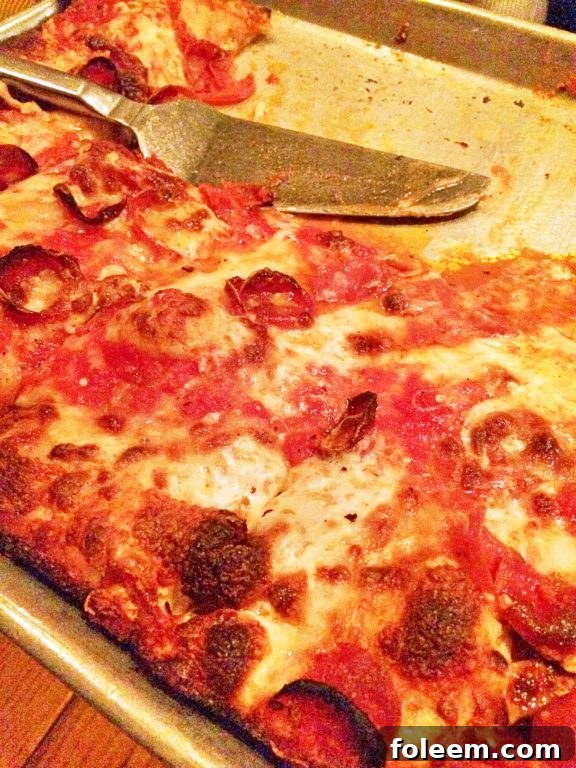 Adrienne's Pizza Bar on Stone Street in the Financial District, New York City. A top pick for authentic New York pizza.