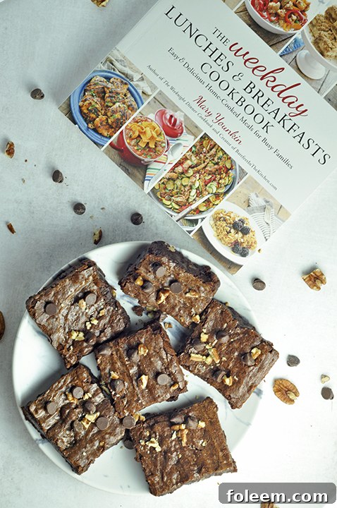 A close-up shot of the incredibly moist and fudgy interior of a Perfect-Every-Time Brownie, showcasing its irresistible texture.