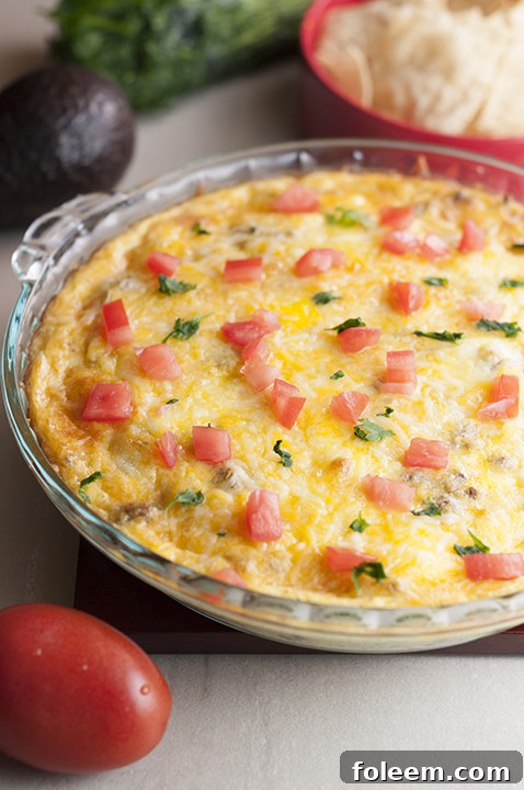 Loaded, gluten free Easy Taco Pie with ground beef for a quick, low carb Mexican meal