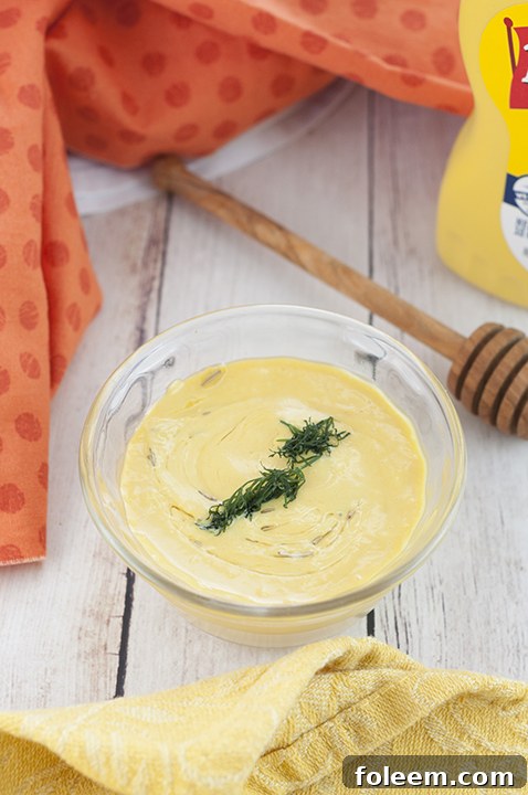 Dill Mustard dipping sauce recipe great for dipping pretzels, hotdogs, chicken fingers, or any appetizer!