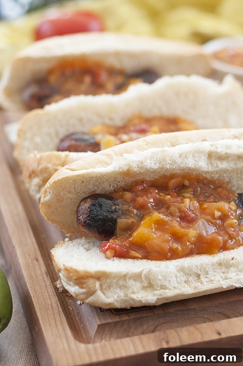 Easy Grilled Beer Brats with Mango Lime Salsa recipe for 4th of July and summer events.