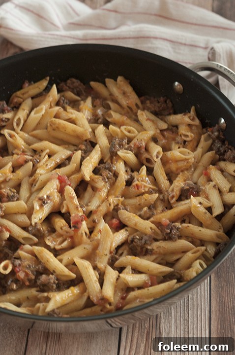 Cheesy Taco Pasta is an easy dinner idea with ingredients you most likely already have in your kitchen! This recipe is my go-to meal when I don't know what else to make!