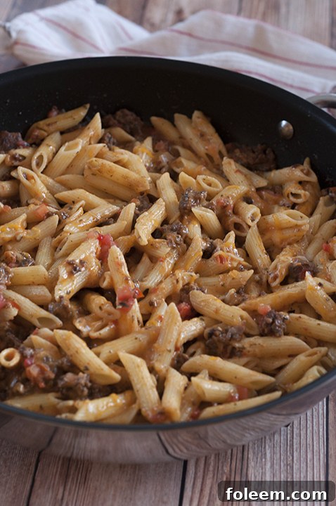 Cheesy Taco Pasta is an easy ground beef dinner idea with ingredients you most likely already have in your kitchen! This recipe is my go-to meal when I don't know what else to make!