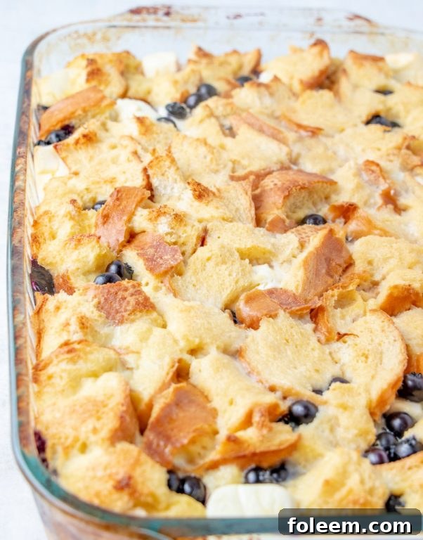 Easy, classic Overnight Blueberry French Toast Casserole is the perfect breakfast or brunch dish that makes for a beautiful presentation and tastes as good as it looks! This is great for an easy potluck recipe, dish to pass at a baby shower, or a holiday brunch or breakfast idea!