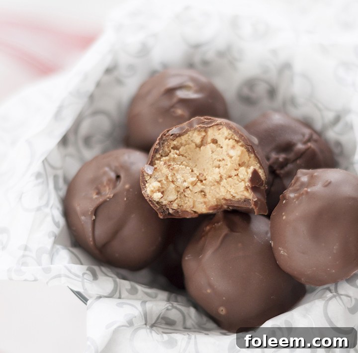 The best Easy No-Bake Peanut Butter Rice Krispie Balls recipe for any holiday party.