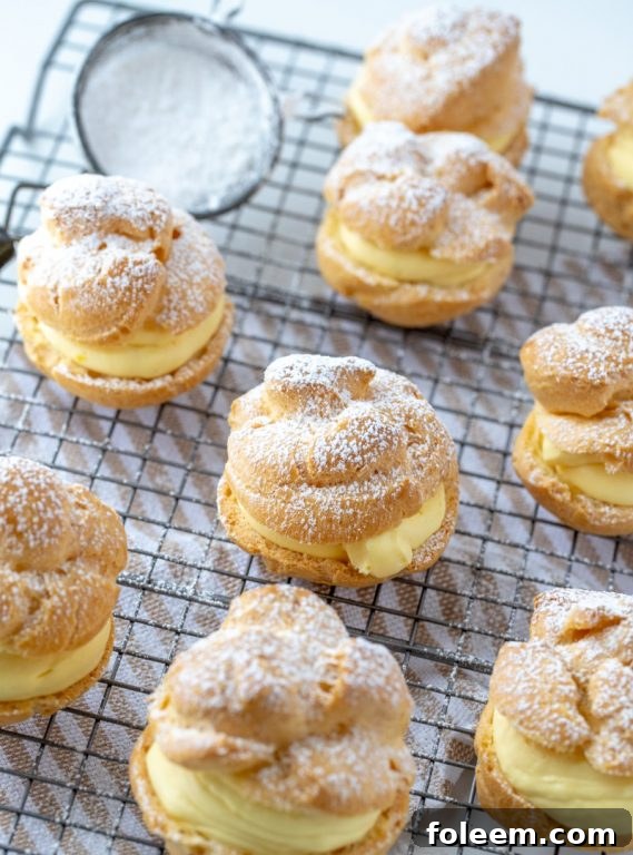 Classic homemade cream puffs filled with creamy vanilla pudding