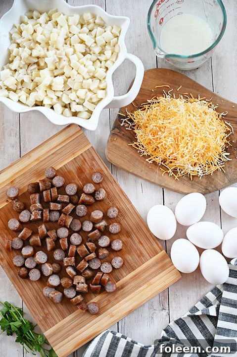 Ingredients prepped for Cheesy Potato Sausage Breakfast Casserole, an easy breakfast or brunch casserole recipe.
