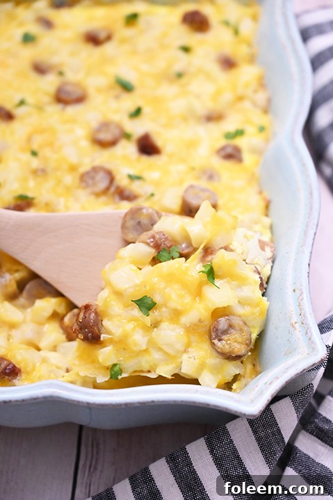 The baked Cheesy Potato Sausage Breakfast Casserole, golden and bubbly.