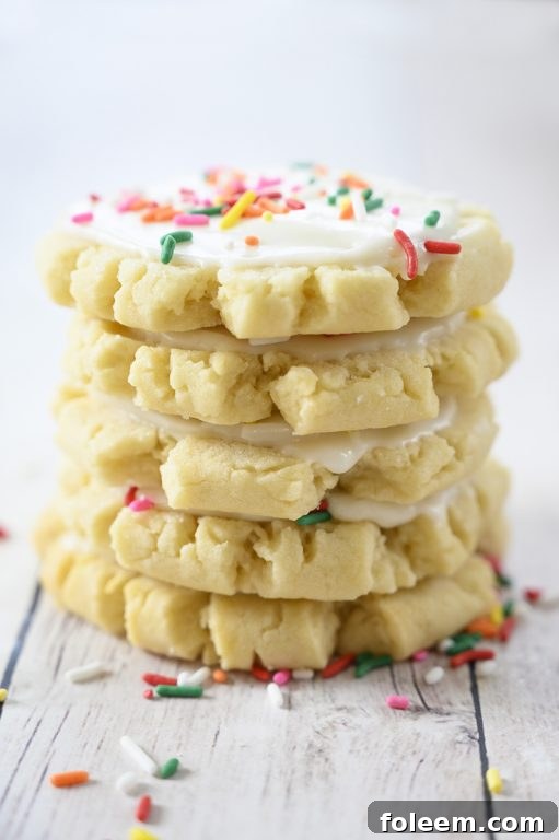 The best Copycat Frosted Swig Sugar Cookies recipe - no chilling of the dough, rolling out the dough, or cutting them out with cookie cutters! These easy cookies are so soft, buttery, and so tasty!