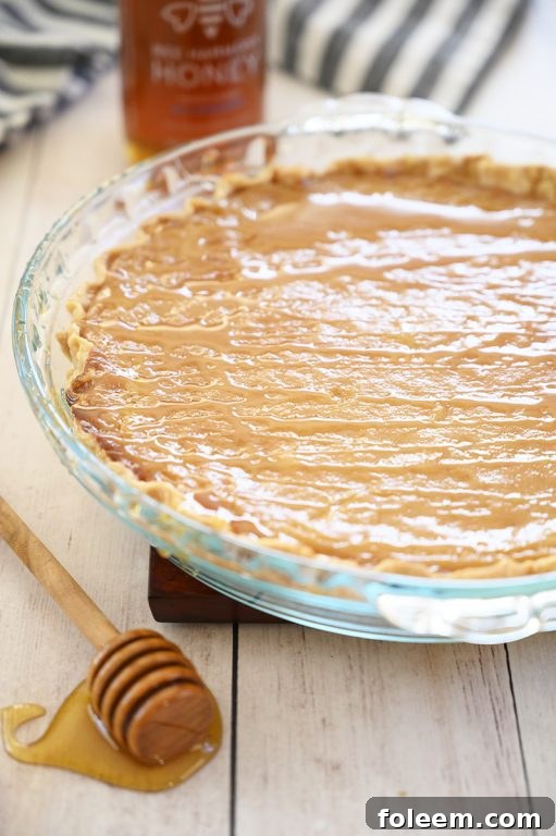 Delicious Salted Honey Pie with a perfect flaky crust, golden custard filling, and a sprinkle of sea salt, ideal for Easter brunch