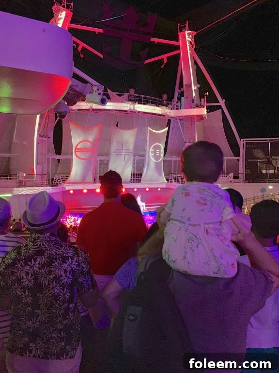 Watching the aqua show on board Royal Caribbean Symphony of the Seas cruise. 