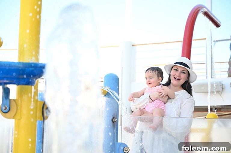 Swimming in the baby Splash zone pool on board Royal Caribbean Symphony of the Seas caribbean cruise. 