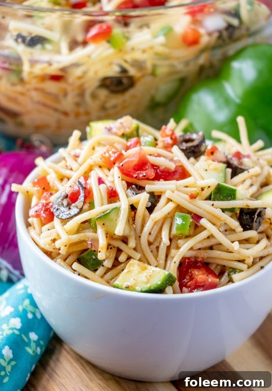 Holiday potluck or picnic side dish idea, California Spaghetti Salad recipe that's great for summer and tastes better the next day.