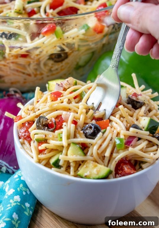 4th of July potluck or picnic easy side dish, California Spaghetti Salad with pasta and zucchini, a great summer recipe.