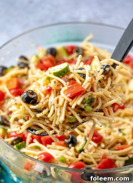 Holiday potluck or picnic easy side dish, California Spaghetti Salad, a diverse texture summer recipe that tastes better the next day.