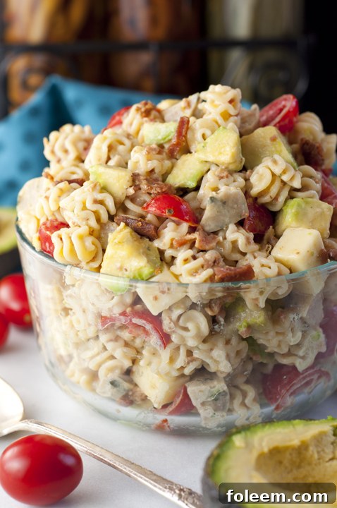 Chicken Club Sausage Pasta Salad recipe has all the flavors of the classic club sandwich in this easy side dish that is ready in a flash for any dinner or picnic! It is somewhat a cross between a pasta salad and a macaroni salad.