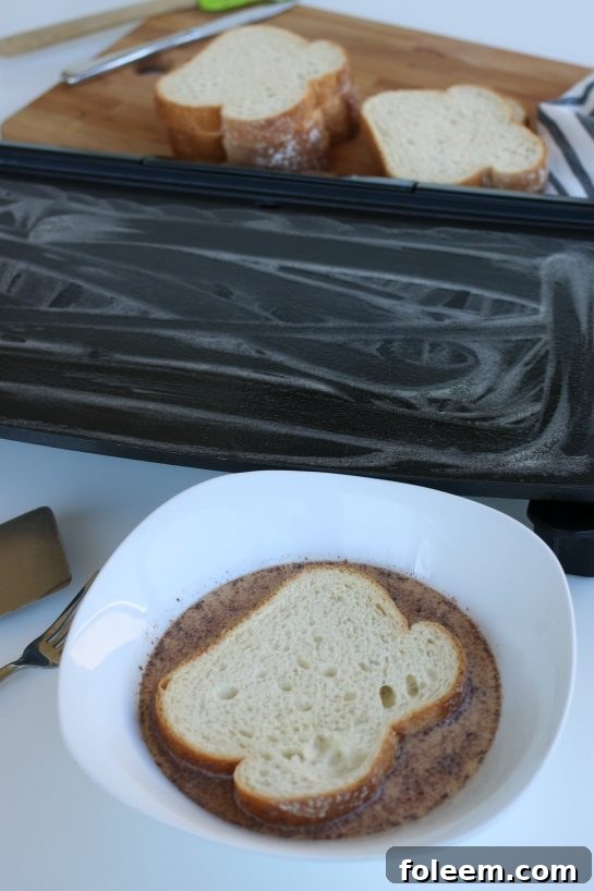 Griddle buttered and thick bread in batter to make french toast.