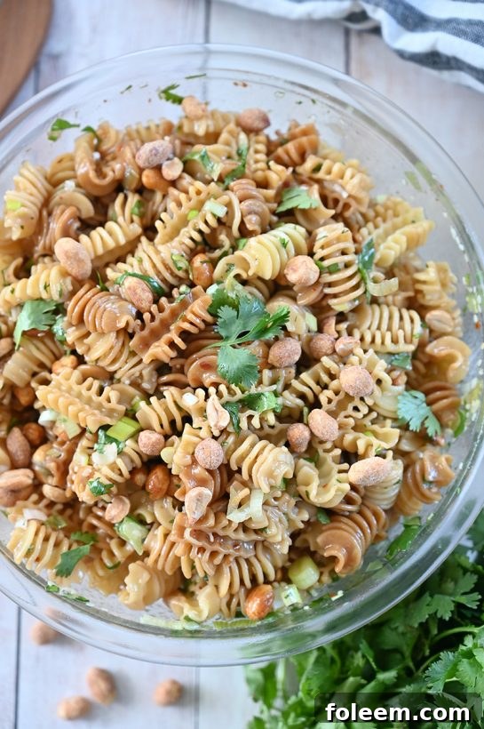 Delicious and easy Sesame Pasta Salad recipe: pasta tossed in a sesame oil and soy sauce-based dressing is a refreshing, Asian-inspired side dish perfect for summer picnics, BBQ, or potlucks!