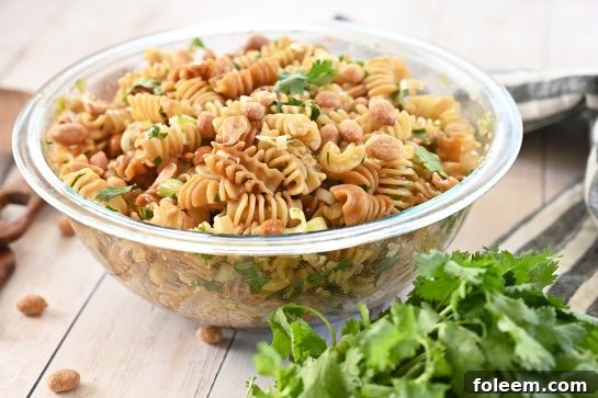 Amazing and easy Sesame Pasta Salad recipe: pasta tossed in a sesame oil and soy sauce-based dressing is a refreshing, Asian-inspired side dish perfect for summer picnics, BBQ, or potlucks!