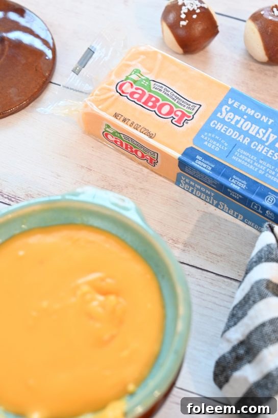 Cabot Seriously Sharp yellow Cheddar cheese used in fondue dip.