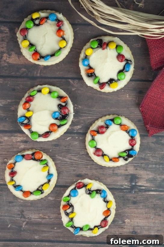 Bright and colorful Christmas Light Bulb Cookies, a fun and easy holiday baking project perfect for kids and families.