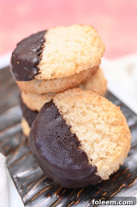 A festive display of Italian Chocolate Dipped Coconut Macaroons, perfect for Christmas or any special gathering.