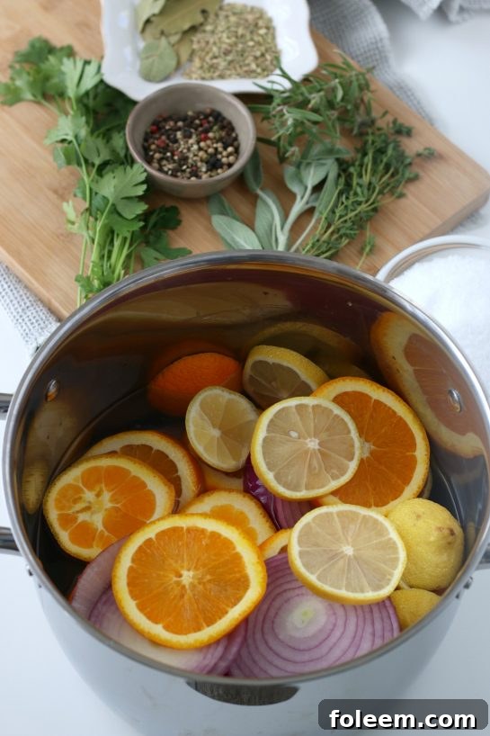 The initial stages of preparing a turkey brine recipe, featuring salt and herbs in a bowl.
