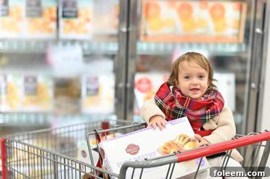 Baby holding Puff pastry assortment at BJ's Wholesale 